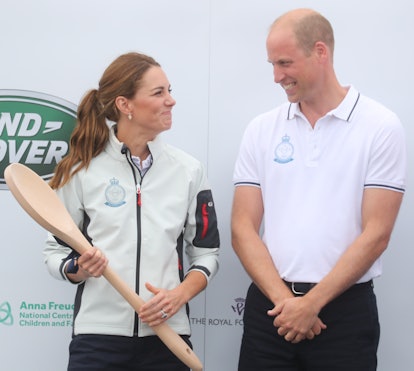 Kate Middleton accepts her giant wooden spoon with dignity. 