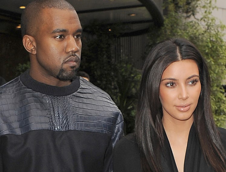 LONDON, ENGLAND - MAY 22: Kim Kardashian and her boyfriend Kanye West leave their hotel on May 22, 2...