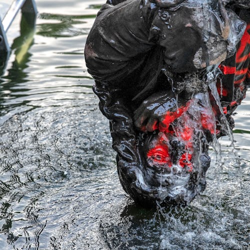 BRISTOL, ENGLAND - JUNE 11: The statue of slave trader Edward Colston is retrieved from Bristol Harb...