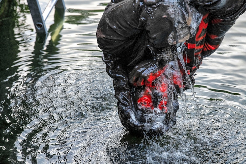 BRISTOL, ENGLAND - JUNE 11: The statue of slave trader Edward Colston is retrieved from Bristol Harb...