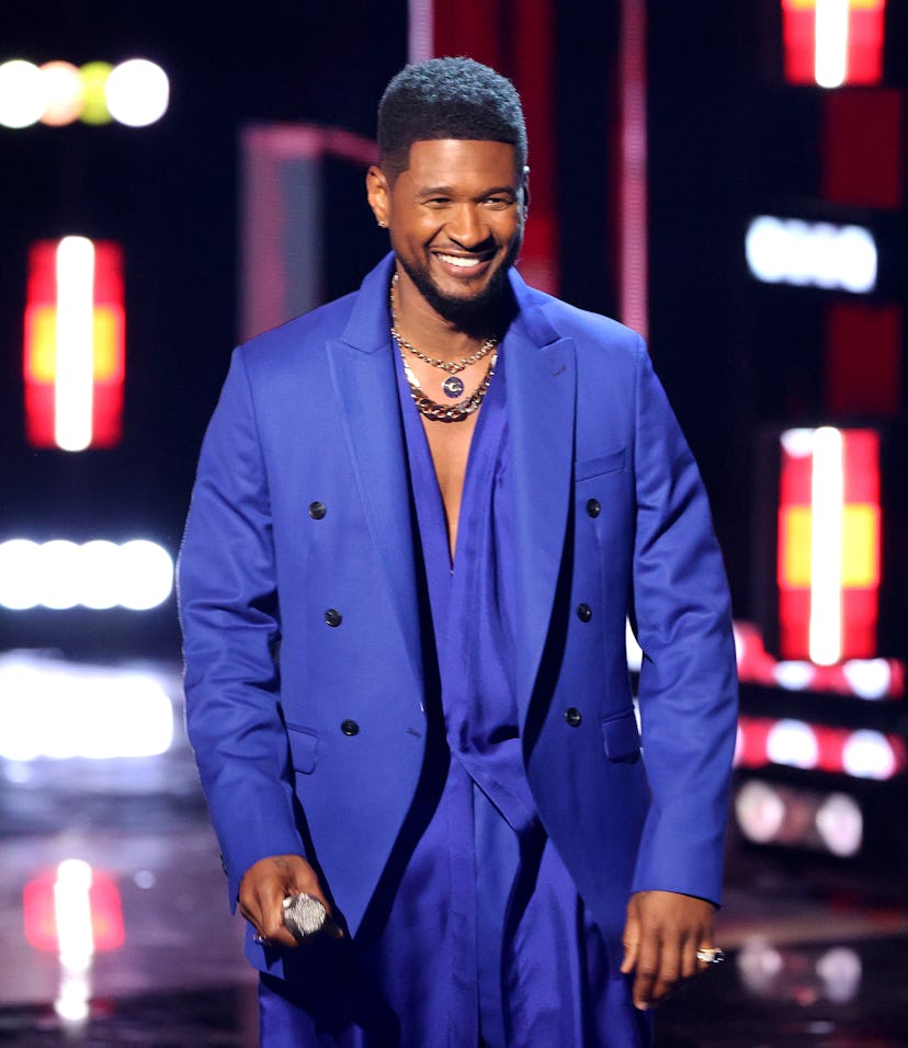 LOS ANGELES, CALIFORNIA - MAY 27: (EDITORIAL USE ONLY) Host Usher speaks onstage at the 2021 iHeartR...