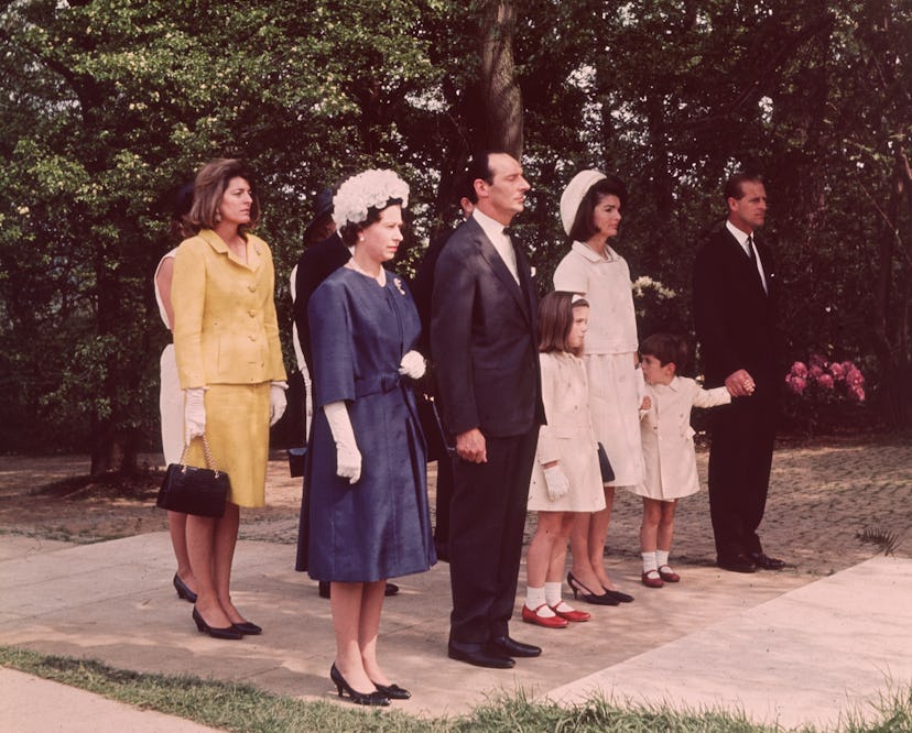 Queen Elizabeth honors President Kennedy.
