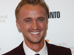 Tom Felton's response to Emma Watson dating rumors is suspicious.