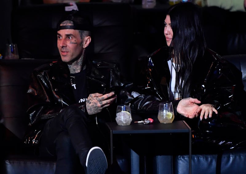 LAS VEGAS, NEVADA - MARCH 27: Travis Barker and Kourtney Kardashian are seen in attendance during the UFC 260 event at UFC APEX on March 27, 2021 in Las Vegas, Nevada. (Photo by Jeff Bottari/Zuffa LLC)