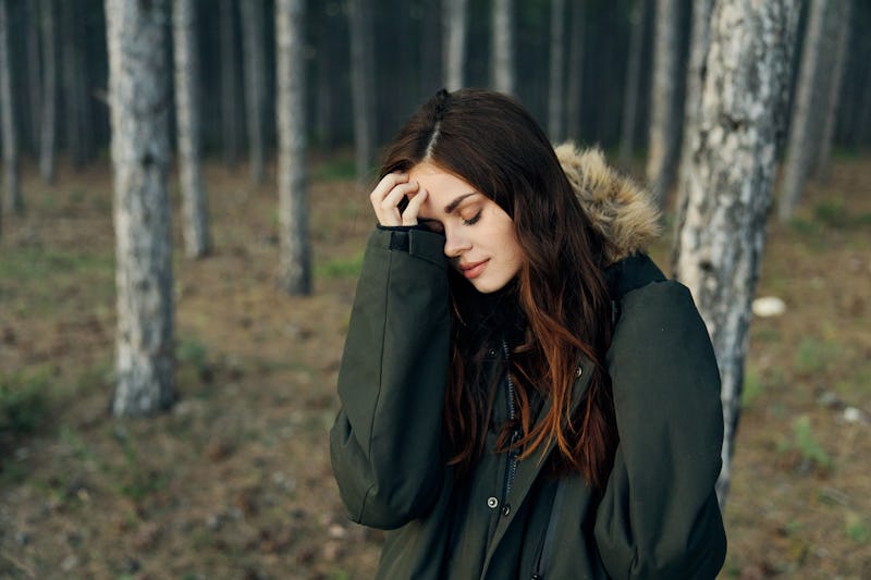 woman walking in the forest