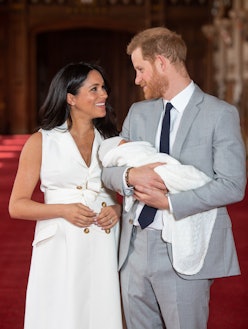 WINDSOR, ENGLAND - MAY 08: Prince Harry, Duke of Sussex and Meghan, Duchess of Sussex, pose with the...