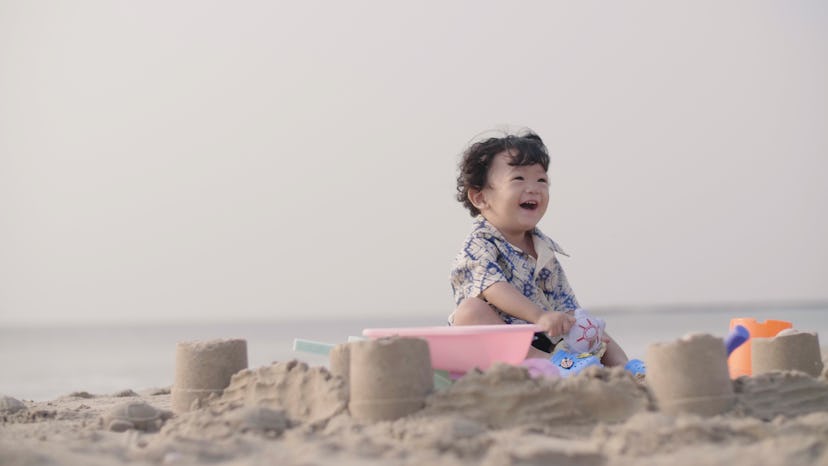 If your baby eats a bunch of sand, experts say to monitor them.