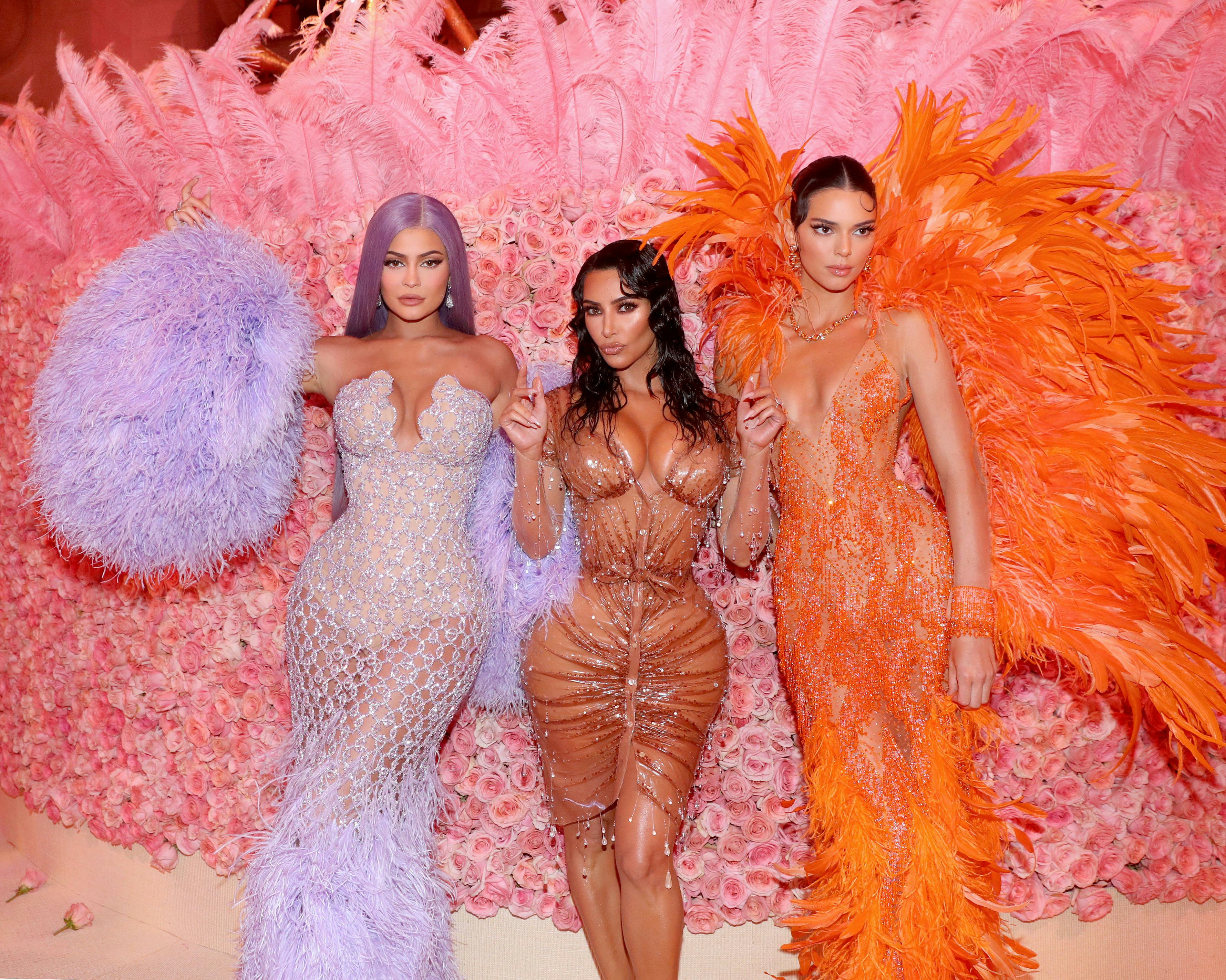 Kylie Jenner, Kim Kardashian West, and Kendall Jenner attend the 2019 Met Gala.