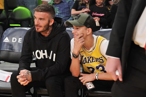 LOS ANGELES, CALIFORNIA - OCTOBER 27: (L-R) David Beckham and his son Romeo Beckham attend a basketb...