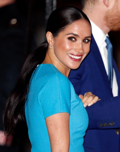 Meghan Markle berry lipstick and low ponytail in 2020
