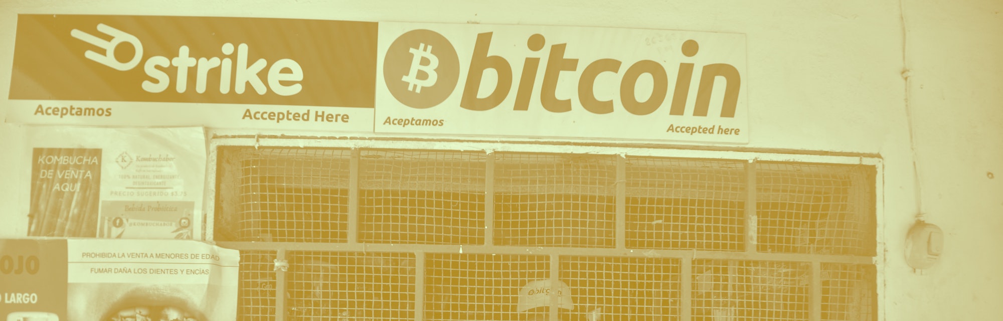 CHILTUIPAN, LA LIBERTAD, EL SALVADOR - 2021/06/07: A man seen at a store that accepts bitcoin while ...