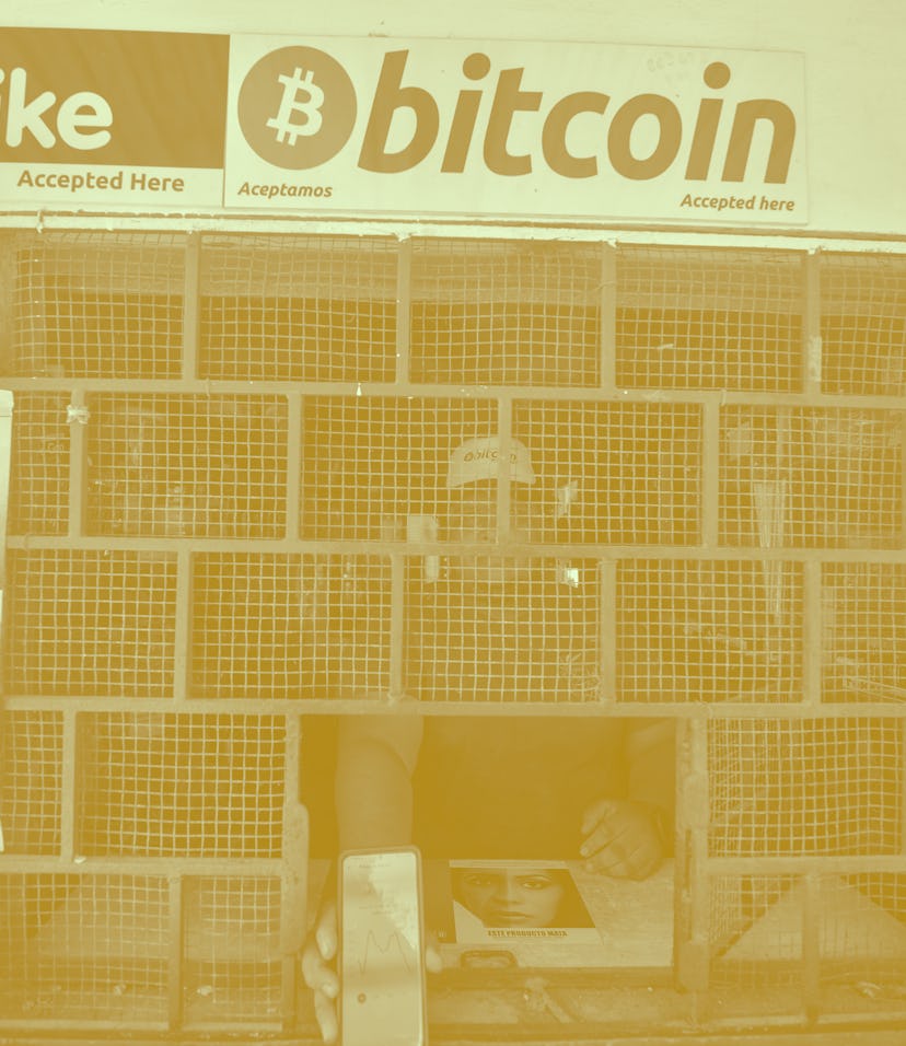 CHILTUIPAN, LA LIBERTAD, EL SALVADOR - 2021/06/07: A man seen at a store that accepts bitcoin while ...