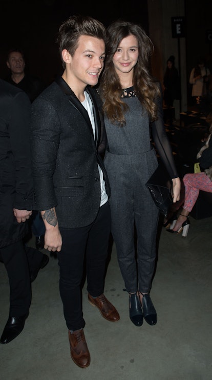 LONDON, ENGLAND - FEBRUARY 17:  Louis Tomlinson from One Direction and Eleanor Calder attend the Top...