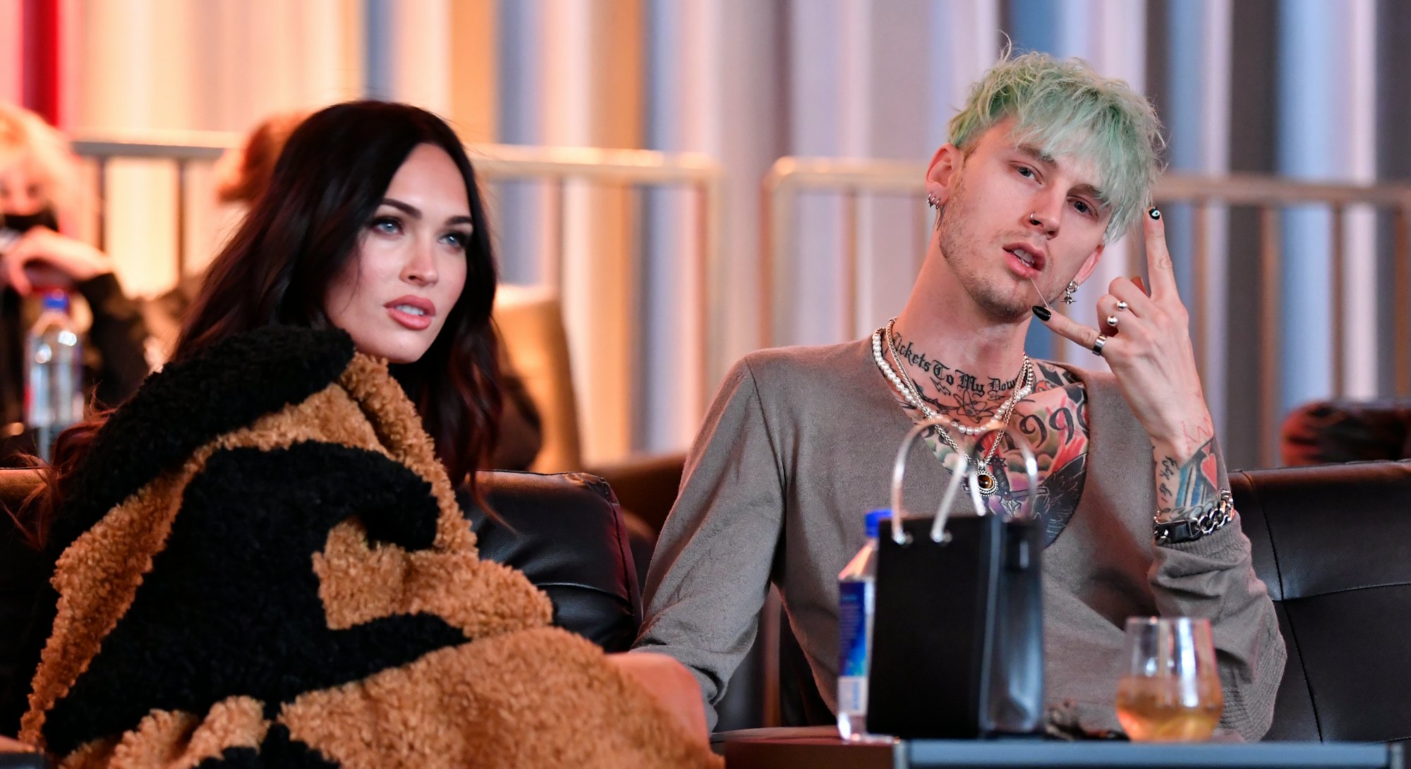 LAS VEGAS, NEVADA - MARCH 27: Machine Gun Kelly and Megan Fox are seen in attendance during the UFC ...