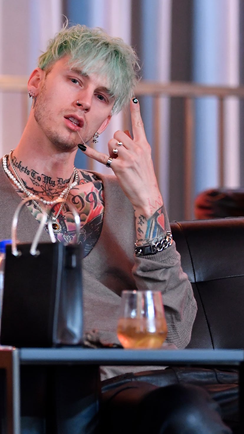 LAS VEGAS, NEVADA - MARCH 27: Machine Gun Kelly and Megan Fox are seen in attendance during the UFC ...