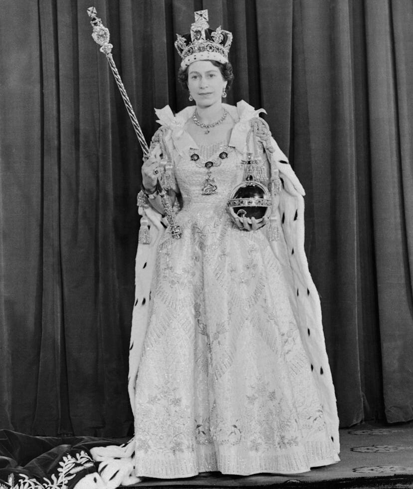 Britain Queen Elizabeth II during her coronation wearing her coronation gown of white satin, the imp...