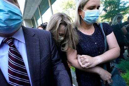 German-born American TV actress Allison Mack(C) arrives at Brooklyn Federal Court on June 30, 2021 i...