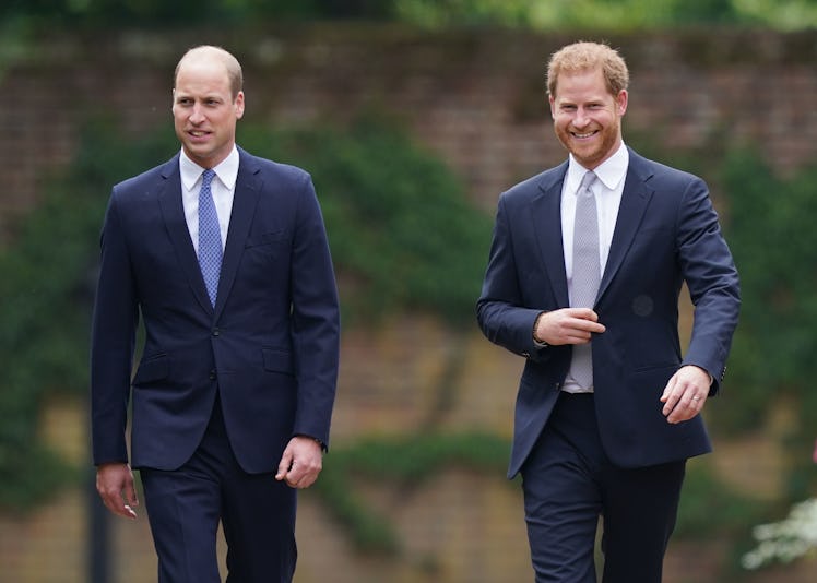 Prince William, Duke of Cambridge (left) and Prince Harry, Duke of Sussex arrive for the unveiling o...