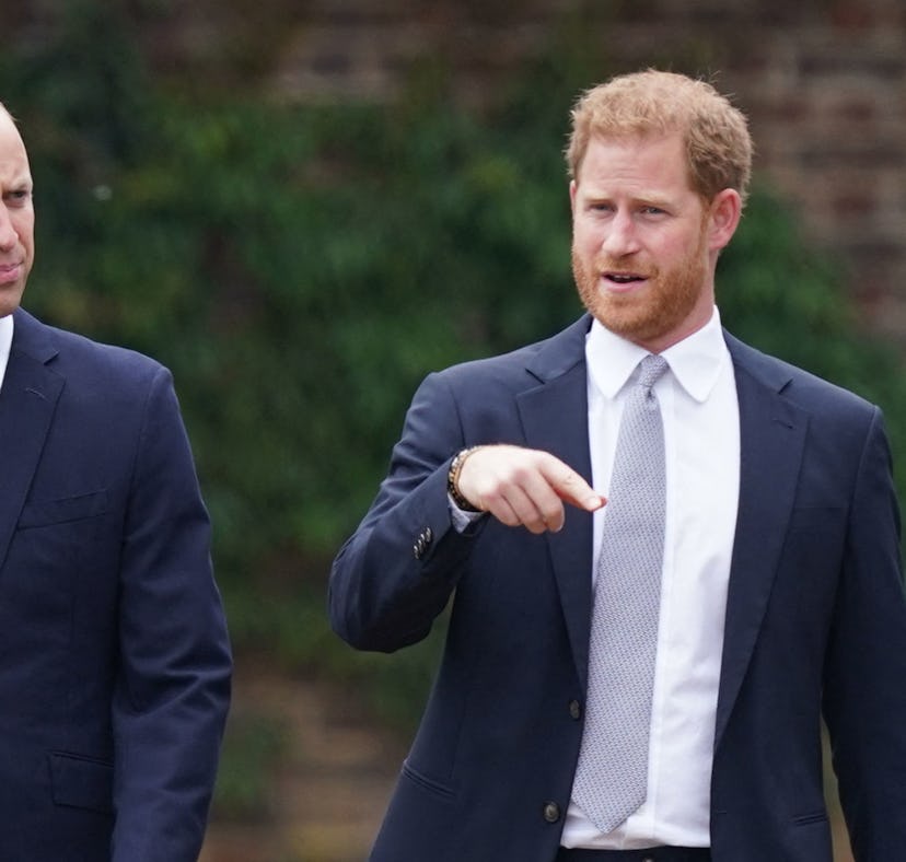 Britain's Prince William, Duke of Cambridge (L) and Britain's Prince Harry, Duke of Sussex chat ahea...