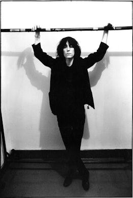 Patti Smith poses before performing at the event "Arista Records Salutes New York with a Festival of...