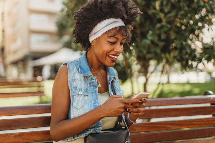Young woman using her smartphone