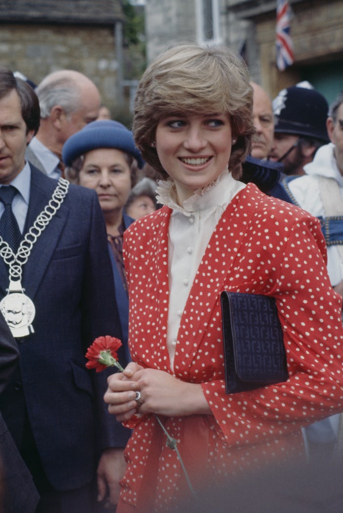 Lady Diana Spencer (1961 - 1997) during her first 'walkabout' with fiance Prince Charles, in Tetbury...