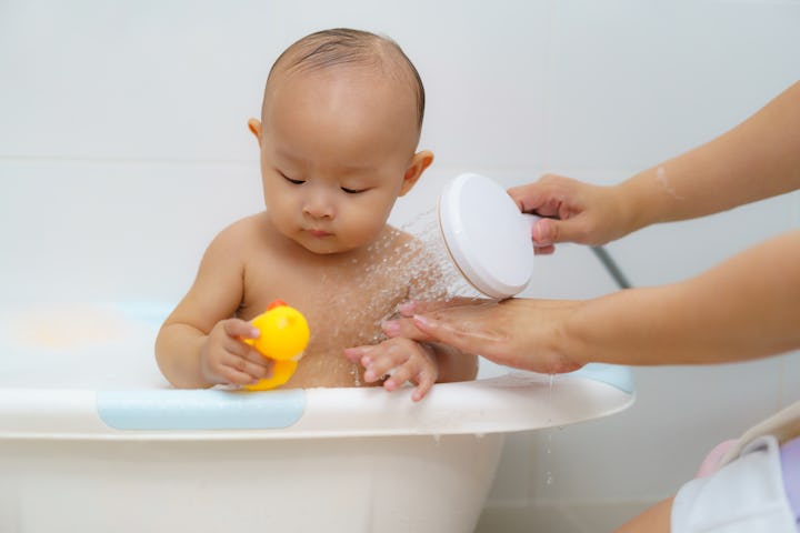 When Can Babies Sit Up In The Bath Tub? The Safe Age Range, Per Experts