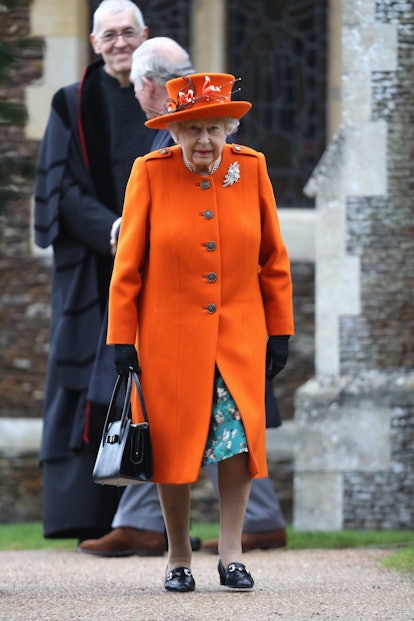 Queen Elizabeth II attends Christmas Day Church service at Church of St Mary Magdalene on December 2...