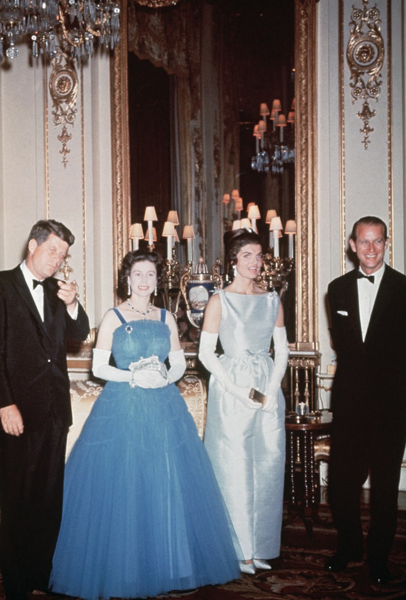 President John F. Kennedy and First Lady Jackie Kennedy pay a visit to the royal family in England.
