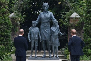 Britain's Prince William, Duke of Cambridge (L) and Britain's Prince Harry, Duke of Sussex unveil a ...