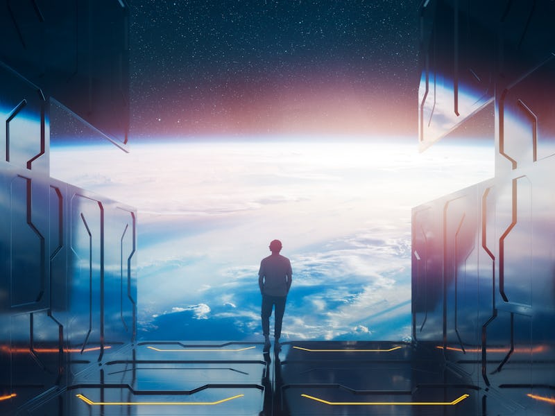 Casual man standing on space platform watching planet Earth. 3D generated image. Earth texture is fr...