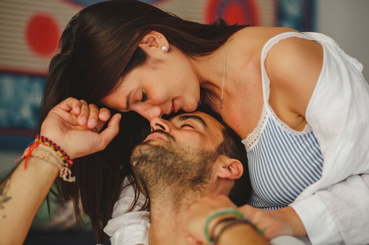 Young beautiful couple having good time at home