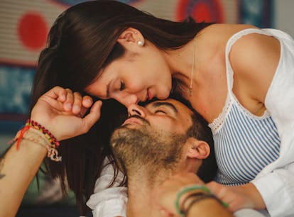 Young beautiful couple having good time at home