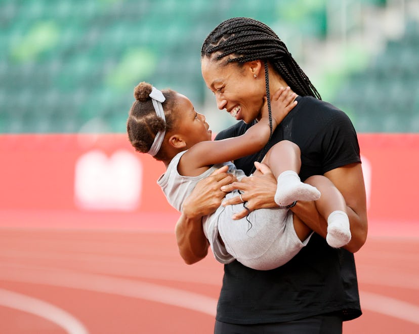 EUGENE, OREGON - JUNE 26: Allyson Felix celebrates with her daughter Camryn after day nine of the 20...