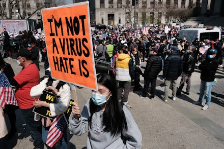 NEW YORK, NEW YORK - APRIL 04: People participate in a protest to demand an end to anti-Asian violen...