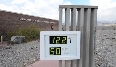 The temperature gauge at the Furnace Creek Visitors Center in Death Valley displays 125 degrees afte...