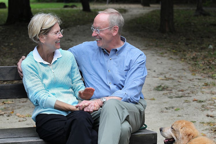 CAMBRIDGE, MA - SEPTEMBER 26: Elizabeth Warren and her husband, Bruce Mann, and their golden retriev...