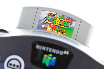 Gothenburg, Sweden - April 30, 2011: A shot of the very popular game Super Mario 64 inserted in a vi...