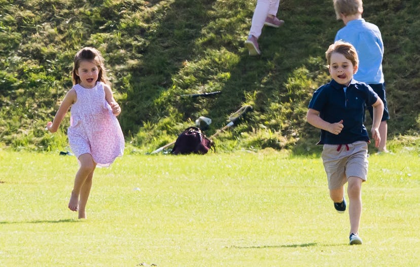 Prince George runs in shorts.