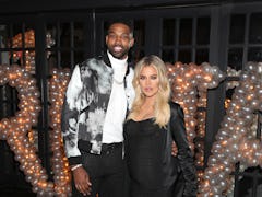 LOS ANGELES, CA - MARCH 10:  Tristan Thompson and Khloe Kardashian pose for a photo as Remy Martin c...