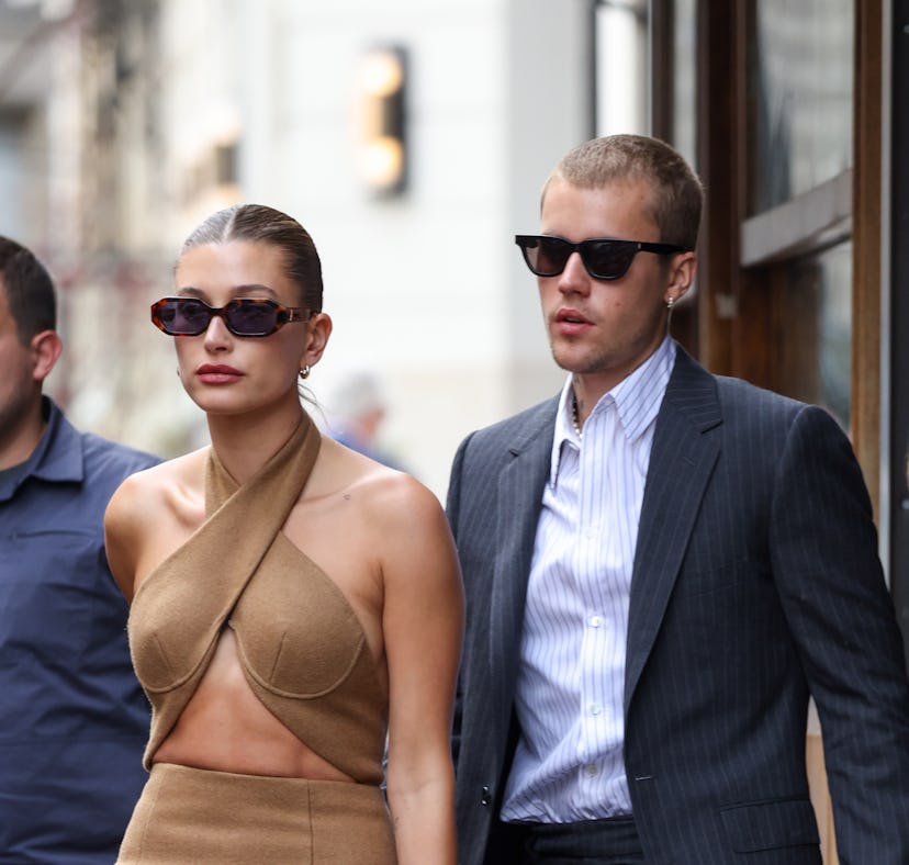 PARIS, FRANCE - JUNE 21: Hailey Bieber and Justin Bieber are seen coming out of a restaurant on June...