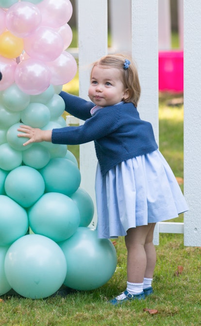 Princess Charlotte laid claim to balloons at a party in Canada.