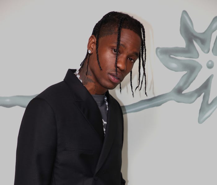 PARIS, FRANCE - JUNE 25: Rapper Travis Scott attends the Dior Homme Menswear Spring Summer 2022 show...