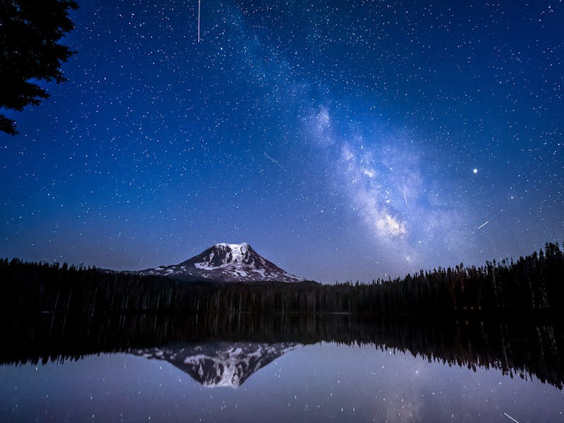 The Delta Aquariids meteor shower and Milky Way over Mt. Adams at Lake Takhlakh, Washington State