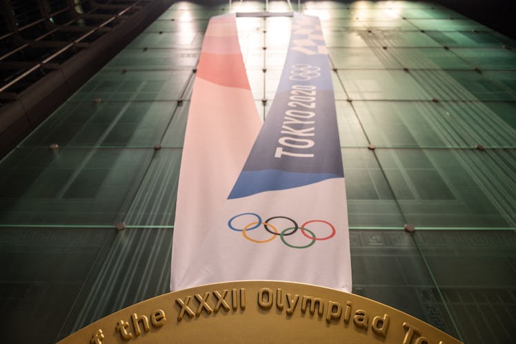 This picture shows a large-scale reproduction of the Tokyo 2020 Olympic Games gold medal as part of ...