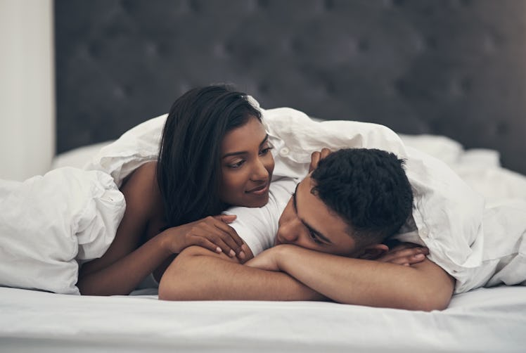 Man struggling to get an erection is comforted by girlfriend