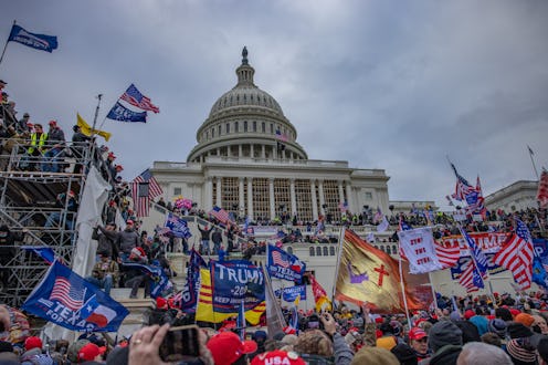 WASHINGTON,DC-JAN6: Supporters of President Trump storm the United States Capitol building.  (Photo ...