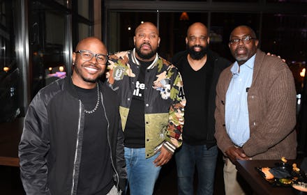 ATLANTA, GEORGIA - JANUARY 27: Issac Hayes III (2nd from L) and guests attend Wahlburgers Peachtree...