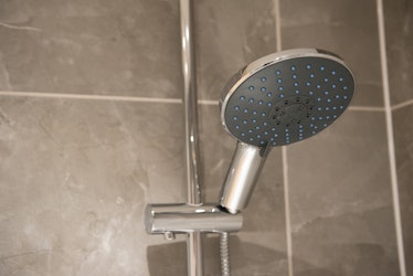 A shower head feels like a tongue when used like a sex toy.