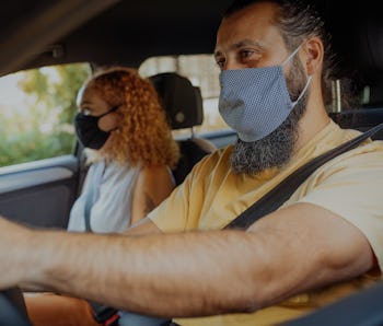 Diverse couple on road trip